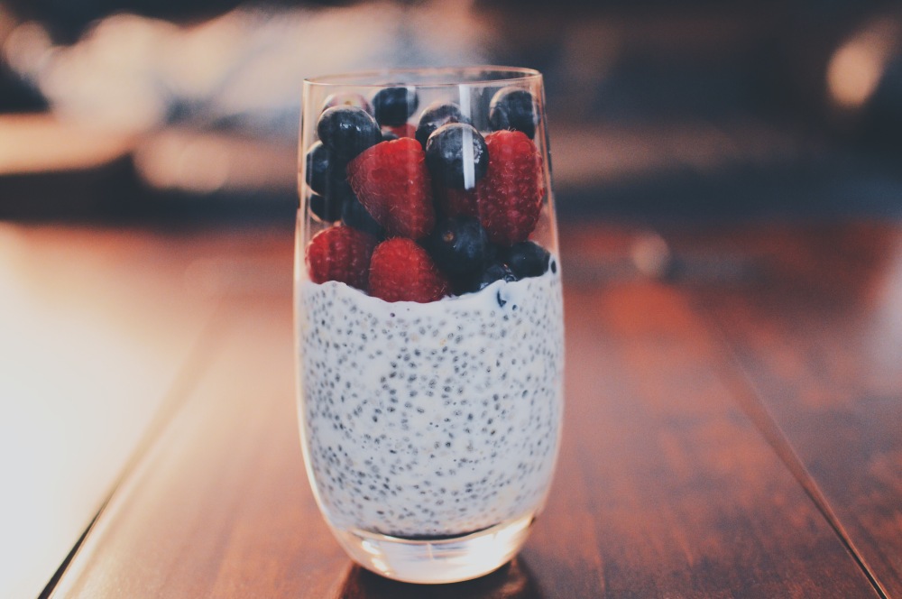 Chia pudding, almond milk, rapsberries and blueberries