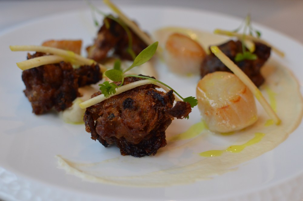 Pan fried scallops, black pudding bhaji, cauliflower puree, curry oil. Branches Ponteland.